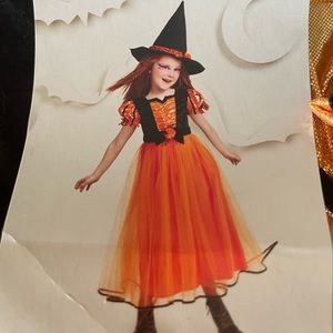 Witch costume. Size small. New in package. Deluxe costume.
